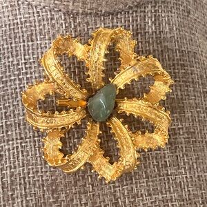 Vintage Gold Floral Brooch with Green Accent